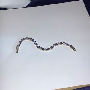 Woman’s Sterling CZ Blue and White Tennis Bracelet.